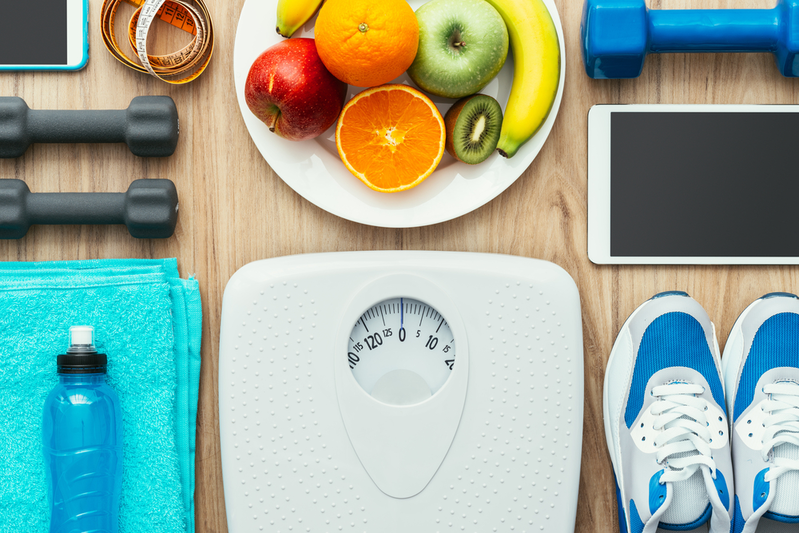 exercise equipment, scale, and fruits
